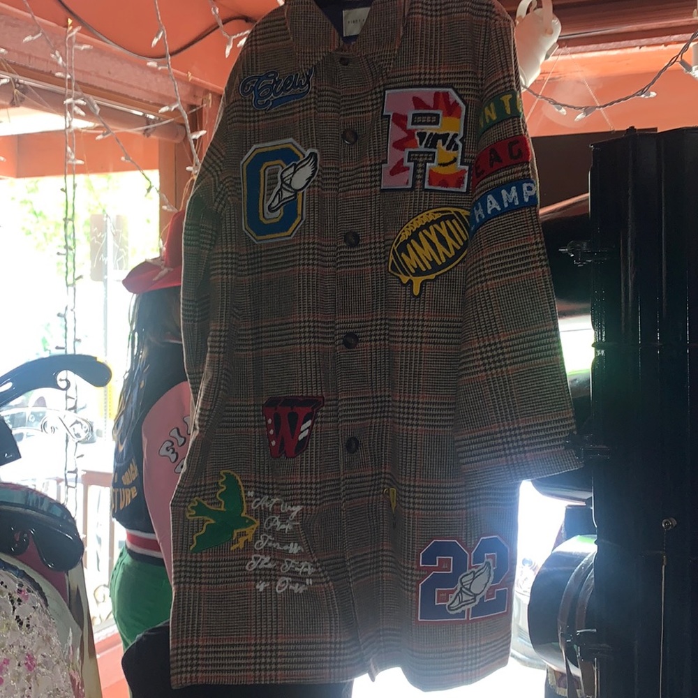 Brand new full length coat size medium brand, first row